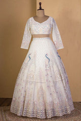 Net Heavy Embroidered White Color Bridal Lehenga Choli