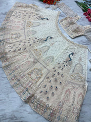Net Heavy Embroidered White Color Bridal Lehenga Choli