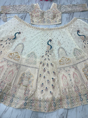 Net Heavy Embroidered White Color Bridal Lehenga Choli