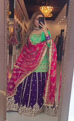 Demanding Georgette Rama Color Top With Navy Blue Lehenga