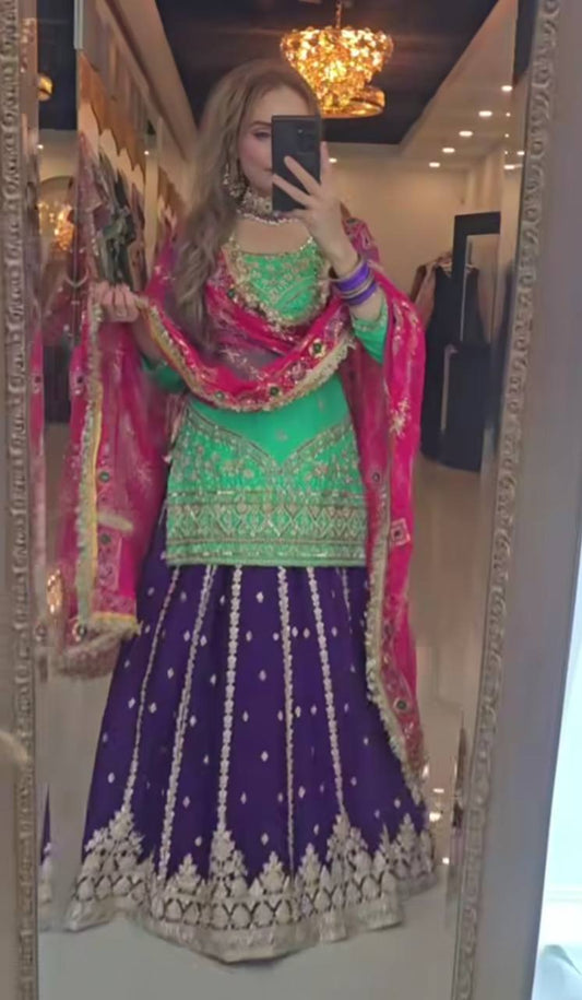 Demanding Georgette Rama Color Top With Navy Blue Lehenga