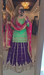 Demanding Georgette Rama Color Top With Navy Blue Lehenga