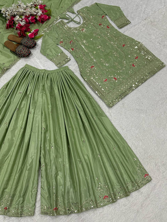 Elegant Pista Color Heavy Work Sharara Suit