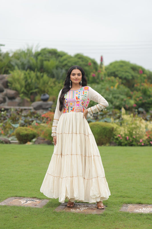 Charming White Gamthi Work Navratri Wear Ruffle Gown