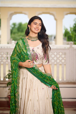 Multi Thread Work White Color Lehenga Choli With Green Dupatta