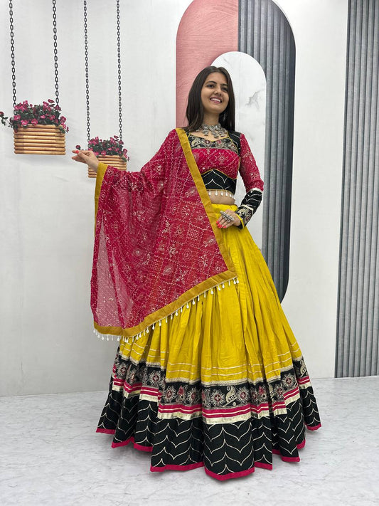Alluring Yellow Cotton Embroidery Work Lehenga Choli For Navratri