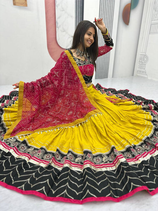 Alluring Yellow Cotton Embroidery Work Lehenga Choli For Navratri