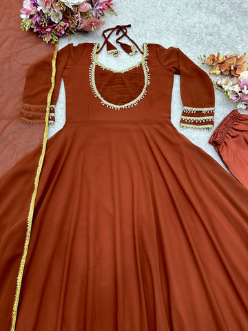 Alluring Brown Georgette with Moti Work Gown