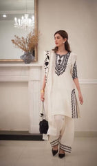 Innovative White Crepe Embroidery Work Palazzo Suit
