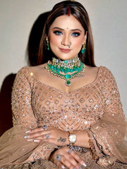 Wedding Collection Beige Color Net Embroidery Lehenga Choli