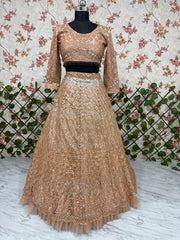 Wedding Collection Beige Color Net Embroidery Lehenga Choli