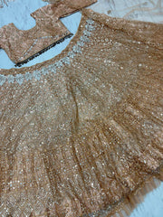 Wedding Collection Beige Color Net Embroidery Lehenga Choli