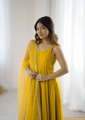 Attractive Yellow Color Roman Silk Work Anarkali Suit