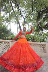 Navratri Wear Orange Color Bandhni Print Work Lehenga