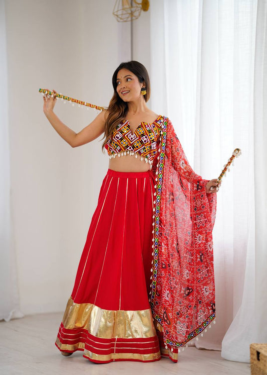 Admiring Orange Color Rayon Lagdi Patta Lehenga Choli For Navratri