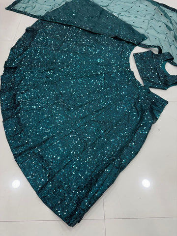 Stylish Green Tapeta Satin Silk Sequence Work Lehenga Choli