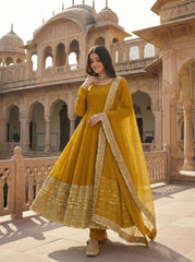Demanding Roman Silk Embroidered Anarkali Gown