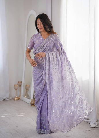 Opulent Peach Silk Saree with Beads Work