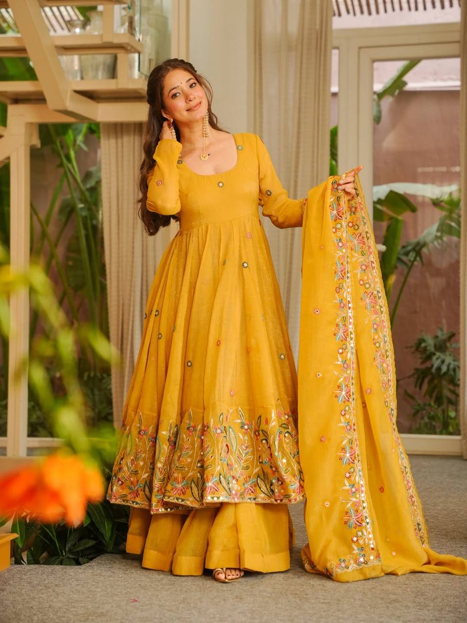 Mesmerizing Yellow Soft Silk with Sequins Embroidery Gown