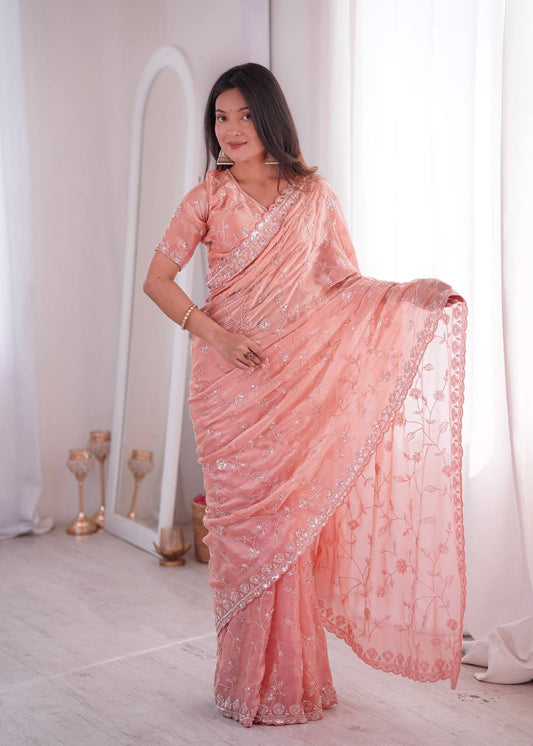 Opulent Peach Silk Saree with Beads Work