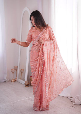 Opulent Peach Silk Saree with Beads Work